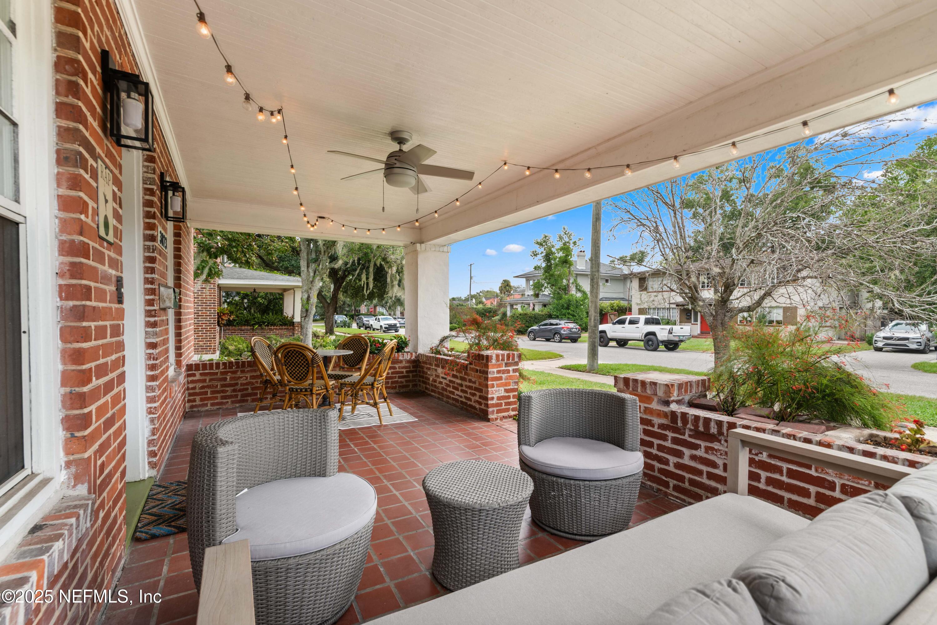 3023 Oak Street Jacksonville, FL 32205 - Photo 6 of 50 a outdoor living space with furniture and a potted plant