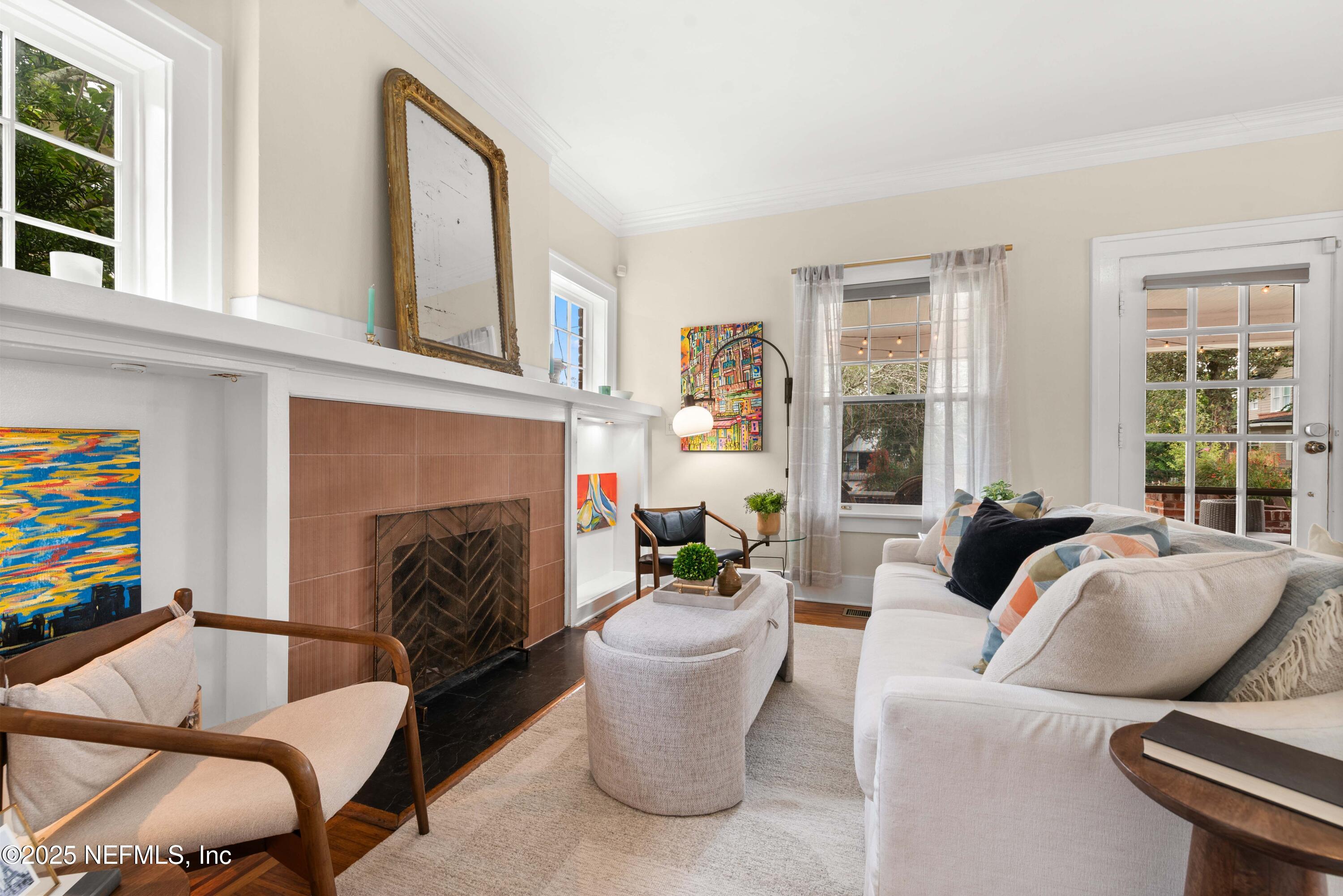 3023 Oak Street Jacksonville, FL 32205 - Photo 9 of 50 a living room with furniture and a fireplace