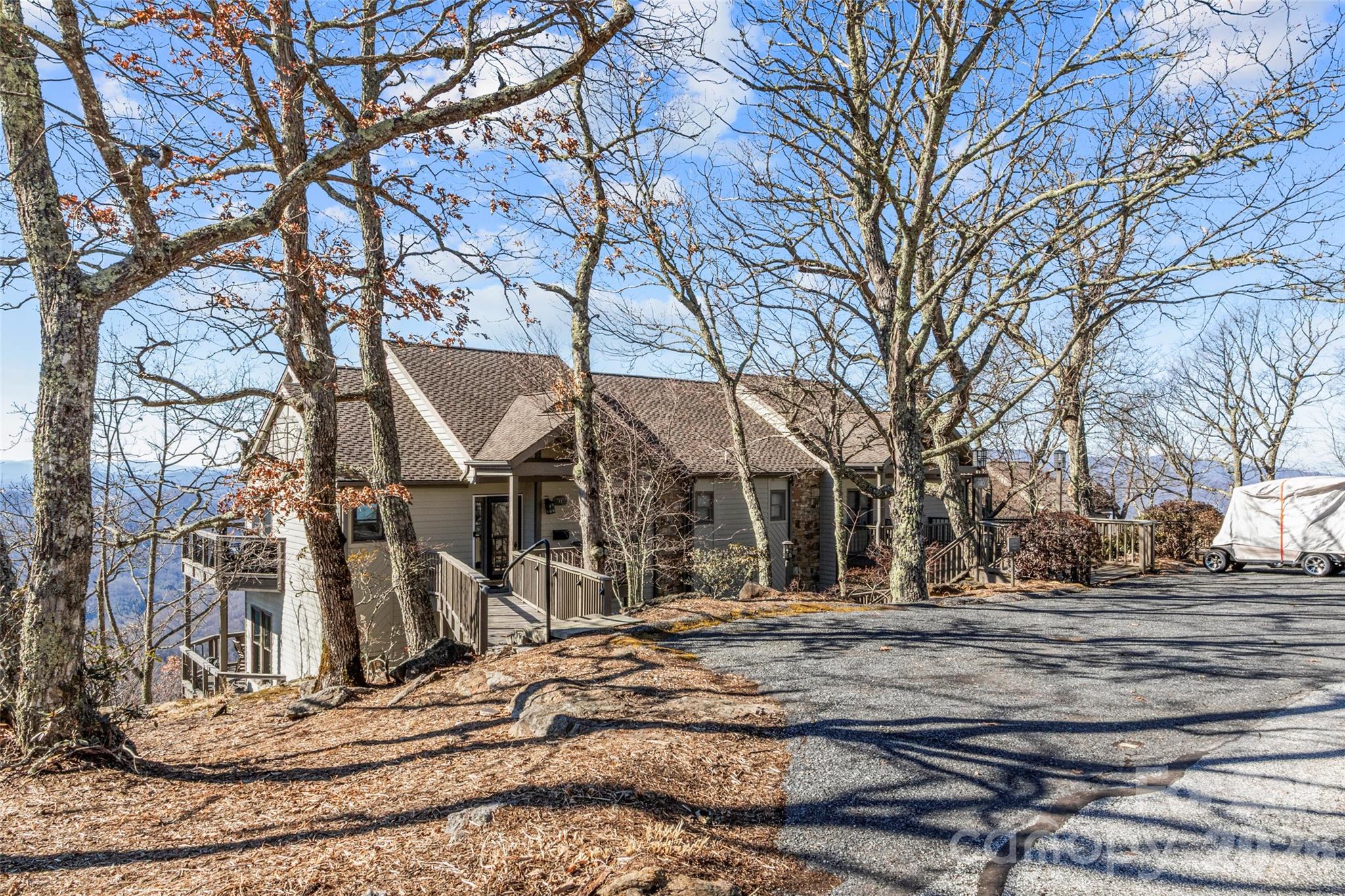 140 Slickrock Road, Unit F3 Burnsville, NC 28714 - Photo 1 of 31 a view of a house with a yard