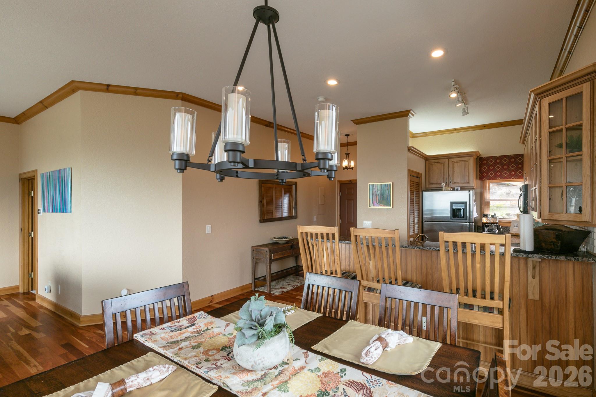 140 Slickrock Road, Unit F3 Burnsville, NC 28714 - Photo 12 of 31 a view of a dining room with furniture