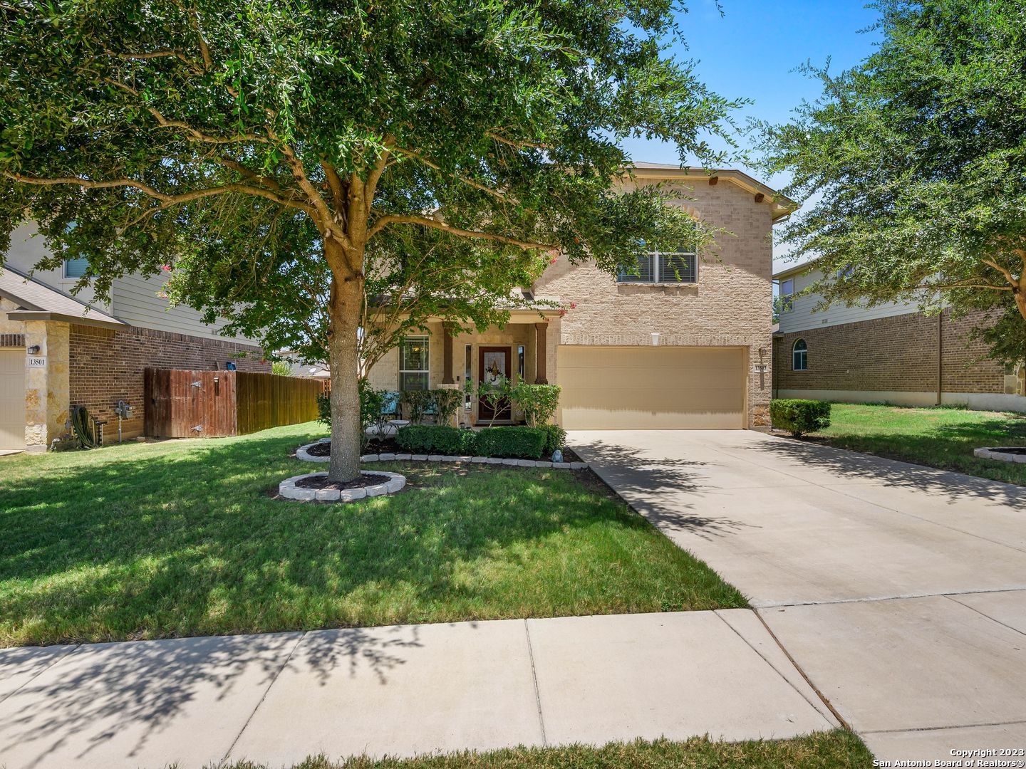 13503 Cranbrook Live Oak, TX 78233 - Photo 1 of 1 front view of a house with a yard