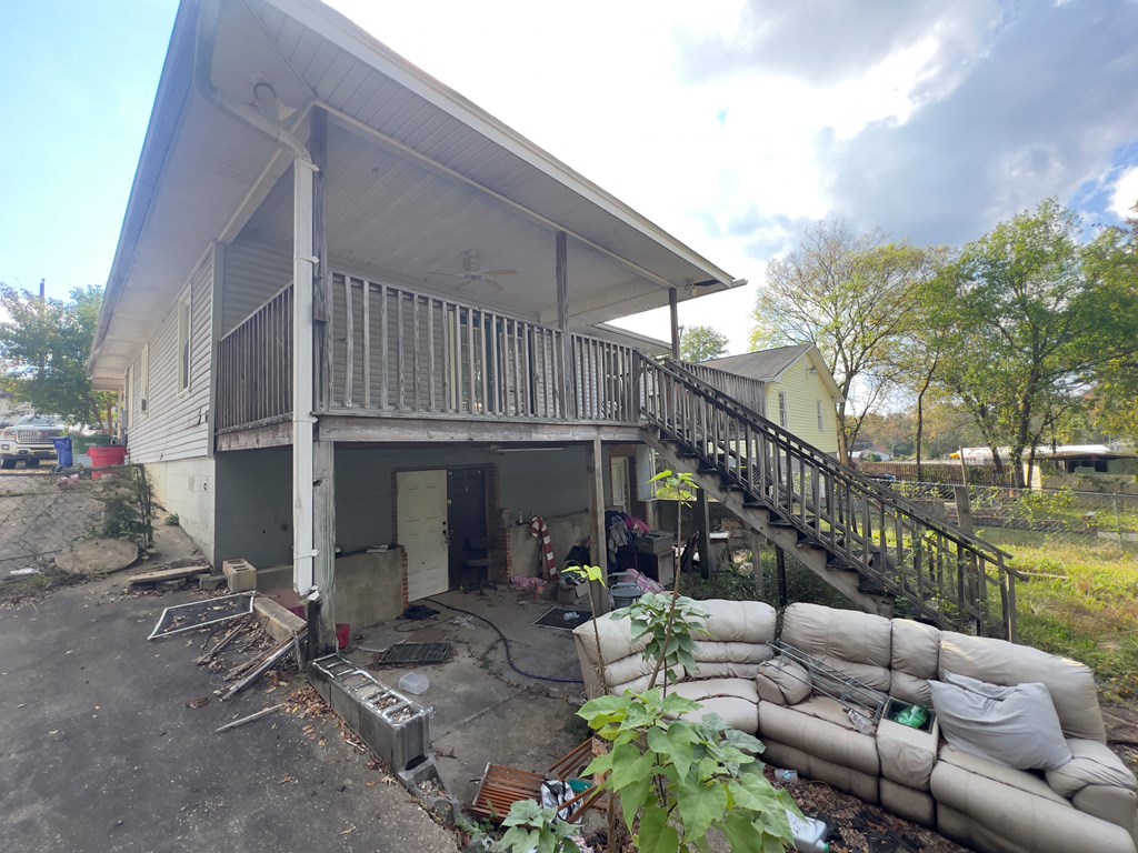 927 Vineville Street Columbus, GA 31904 - Photo 9 of 11 a view of a patio with couches table and chairs and potted plants