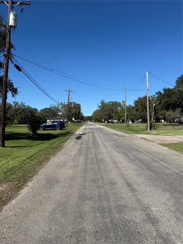 a view of a street with a building