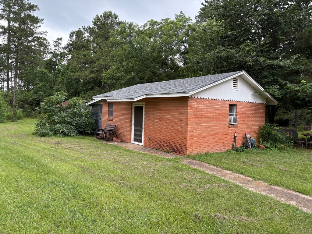 5152 Richardson Road East Livingston, TX 77351 - Photo 12 of 13 a front view of house with yard and trees