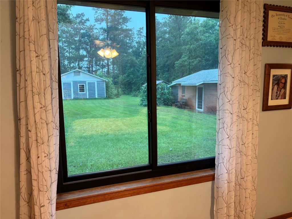 5152 Richardson Road East Livingston, TX 77351 - Photo 8 of 13 a view of a window and a yard