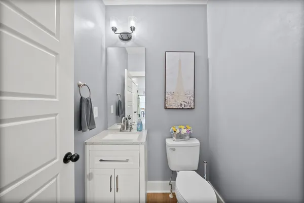 a bedroom with a bed and a television