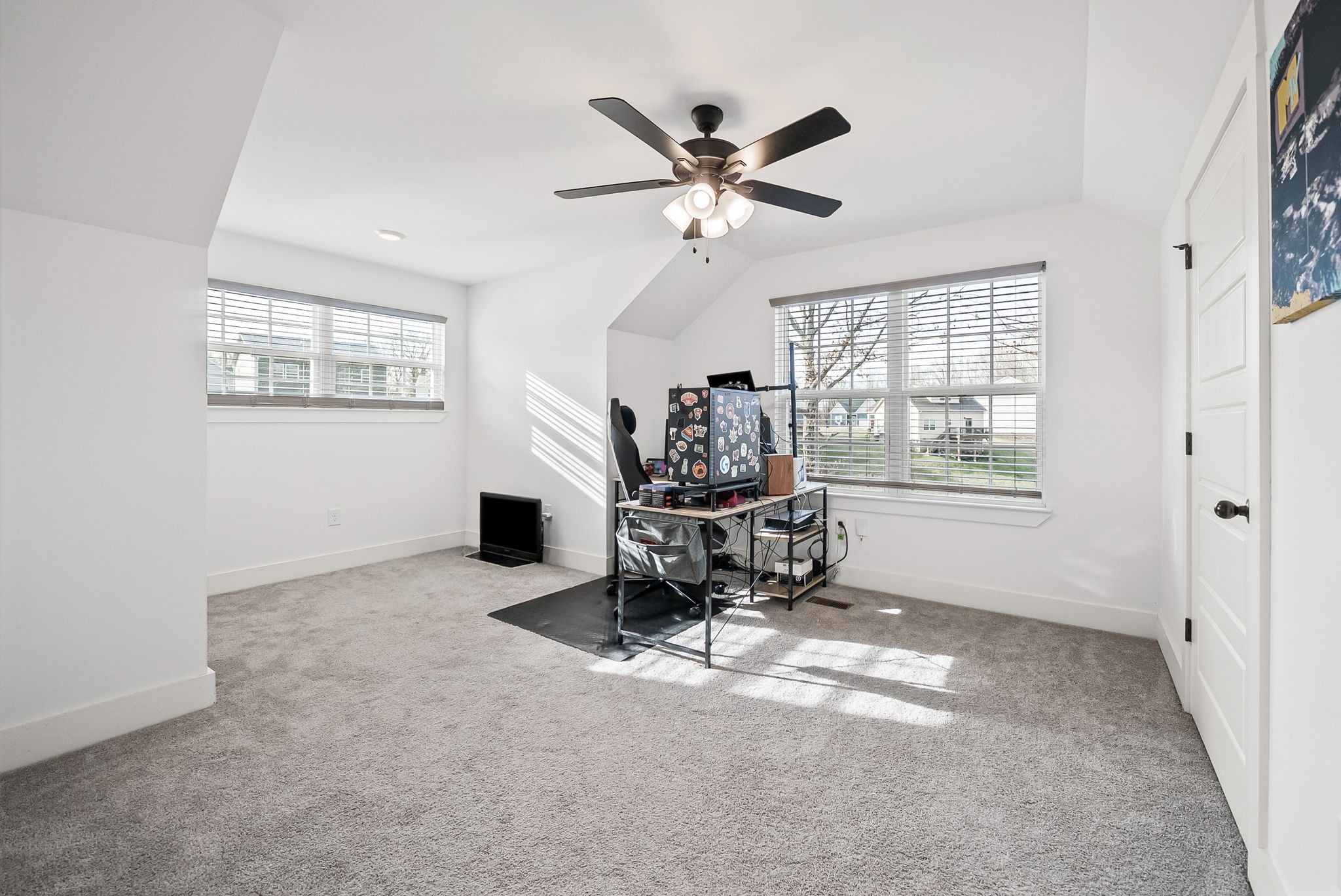 1160 Jonathan Lane Springfield, TN 37172 - Photo 18 of 26 a workspace with chandelier fan and windows