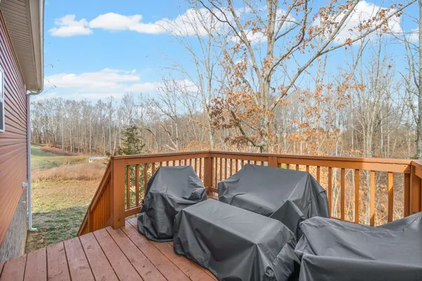 a view of jacuzzi with trees in front of it