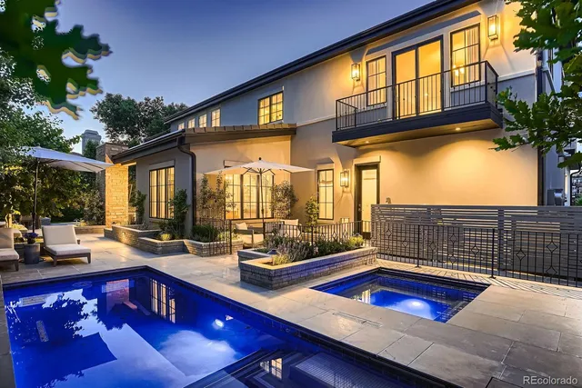 a view of swimming pool with outdoor seating