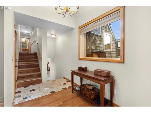 a hallway with a large mirror