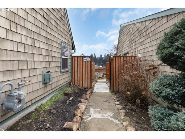 a backyard of a house with seating space