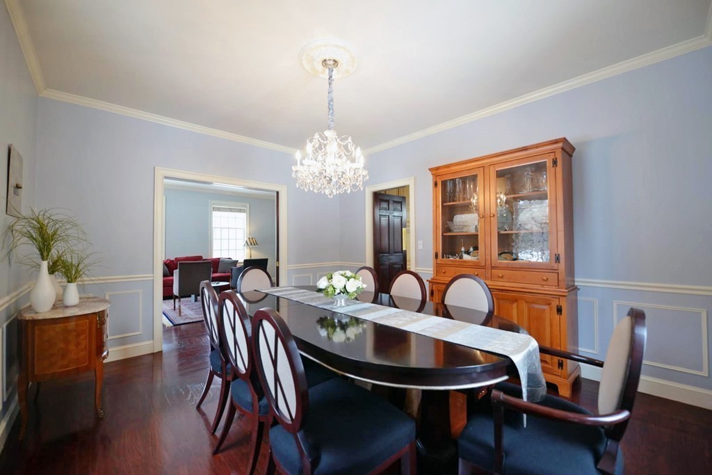 73 Longfellow Road Wellesley, MA 02481 - Photo 7 of 11 a view of a dining room with furniture and chandelier