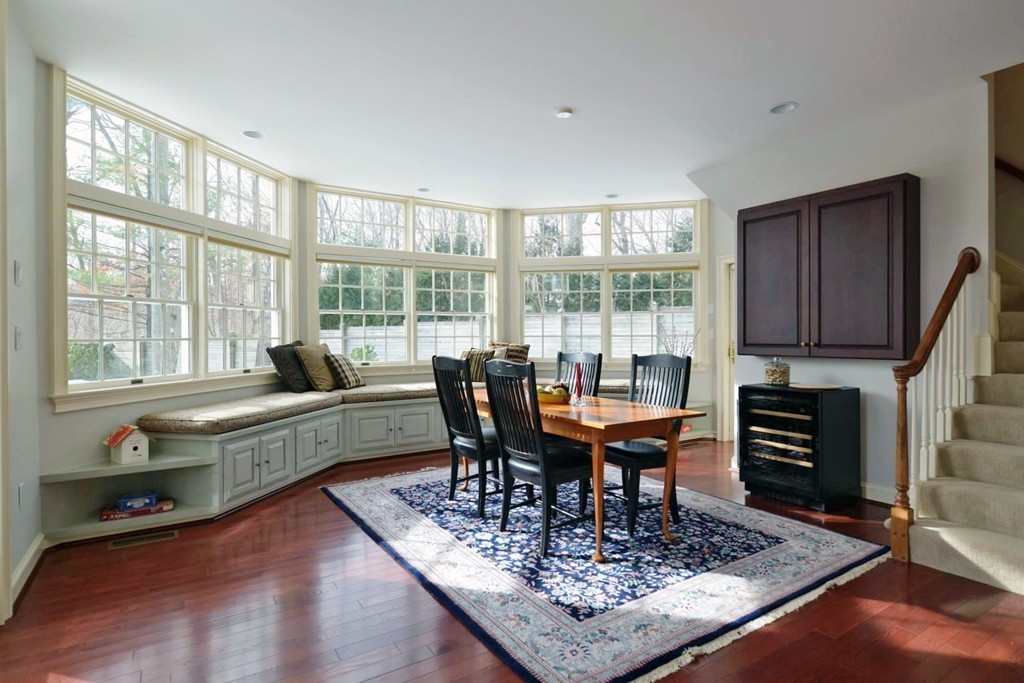 73 Longfellow Road Wellesley, MA 02481 - Photo 8 of 11 a living room with fireplace furniture and a wooden floor