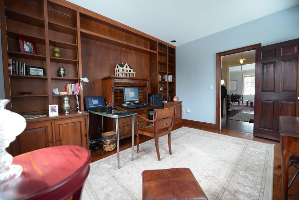 73 Longfellow Road Wellesley, MA 02481 - Photo 9 of 11 a living room with furniture and a fireplace