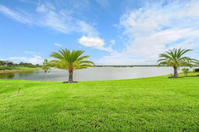 a view of a lake and a yard