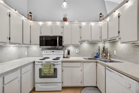 $245,000 | 6555 Chasewood Drive, Unit H, Jupiter, FL 33458