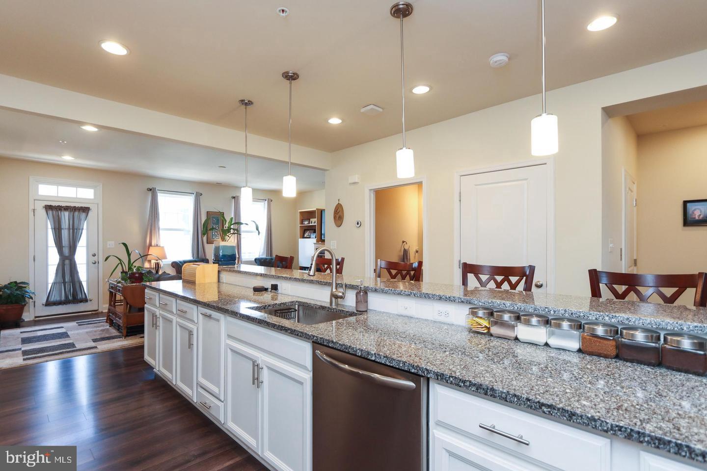 7146 Proclamation Place Frederick, MD 21703 - Photo 3 of 26 a large kitchen with lots of counter space and a sink