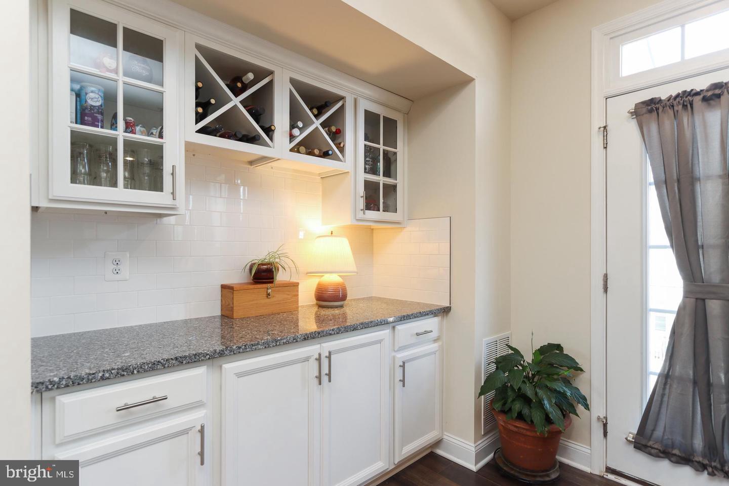 7146 Proclamation Place Frederick, MD 21703 - Photo 10 of 26 a kitchen with a sink and a window