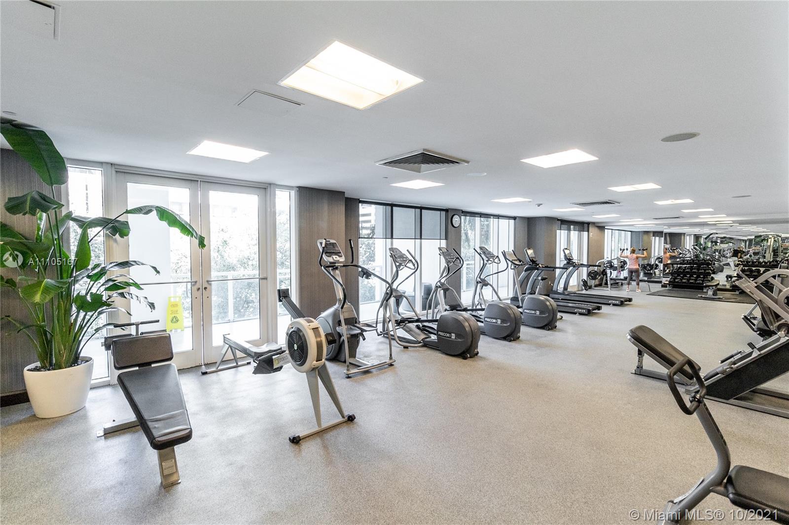 951 Brickell Avenue, Unit 2706 Miami, FL 33131 - Photo 28 of 35 a view of a room with gym equipment