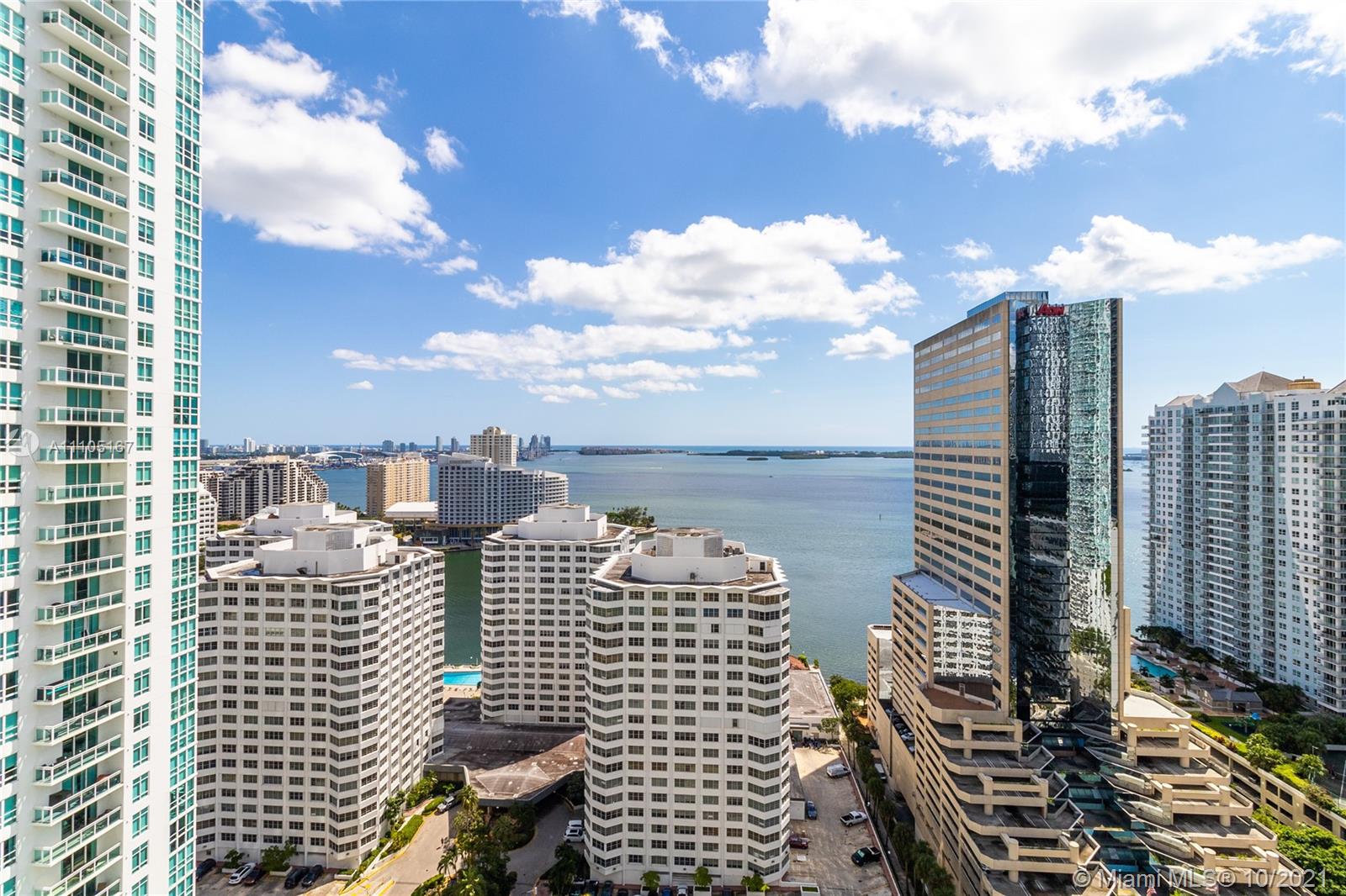 951 Brickell Avenue, Unit 2706 Miami, FL 33131 - Photo 4 of 35 a city view with tall buildings