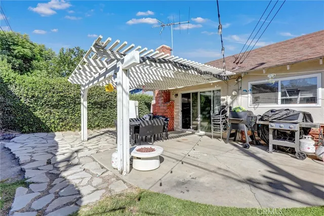 a view of a swimming pool with a patio