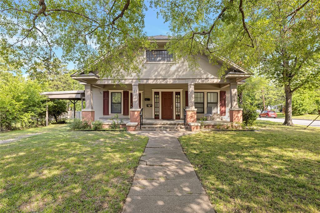 a front view of a house with swimming pool