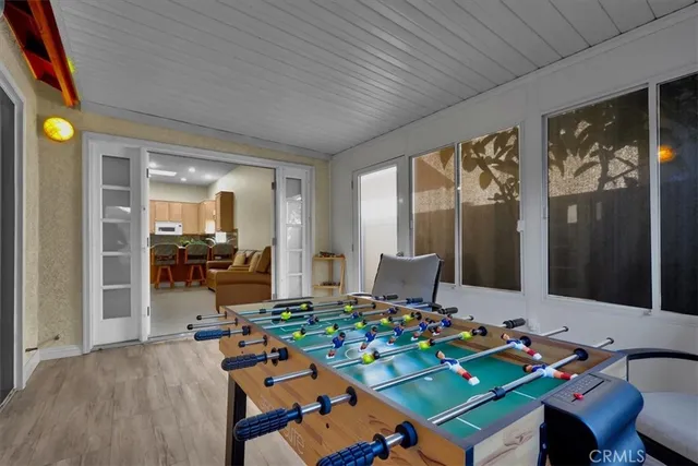 a room with furniture and a flat screen tv