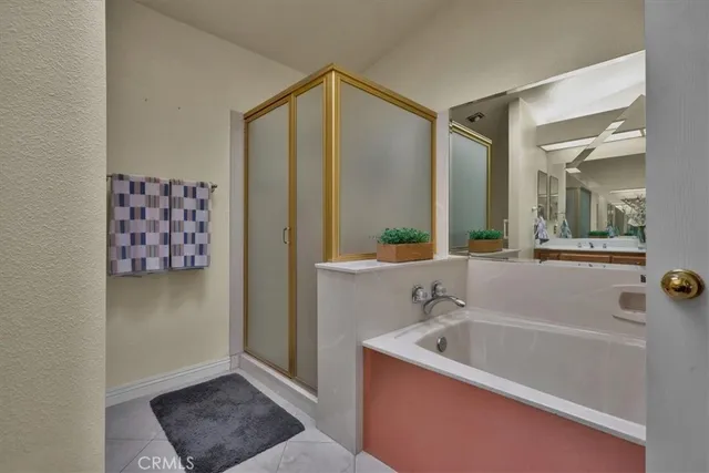 a bathroom with a bathtub and a sink