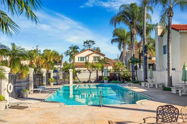 a view of a park with palm trees
