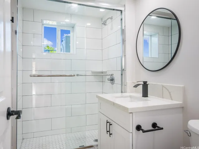 a view of a car parked in front of house