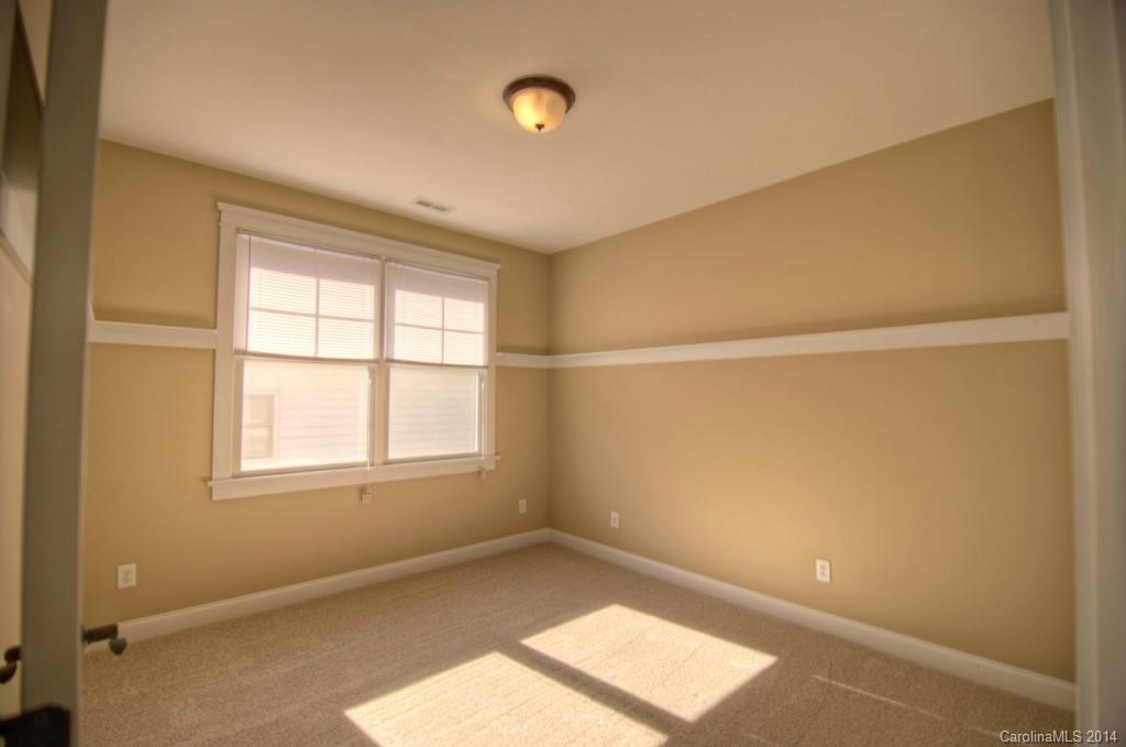 326 Third Baxter Street Fort Mill, SC 29708 - Photo 14 of 15 a view of an empty room with a window