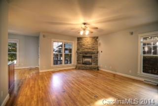326 Third Baxter Street Fort Mill, SC 29708 - Photo 9 of 15 wooden floor in an empty room with a window