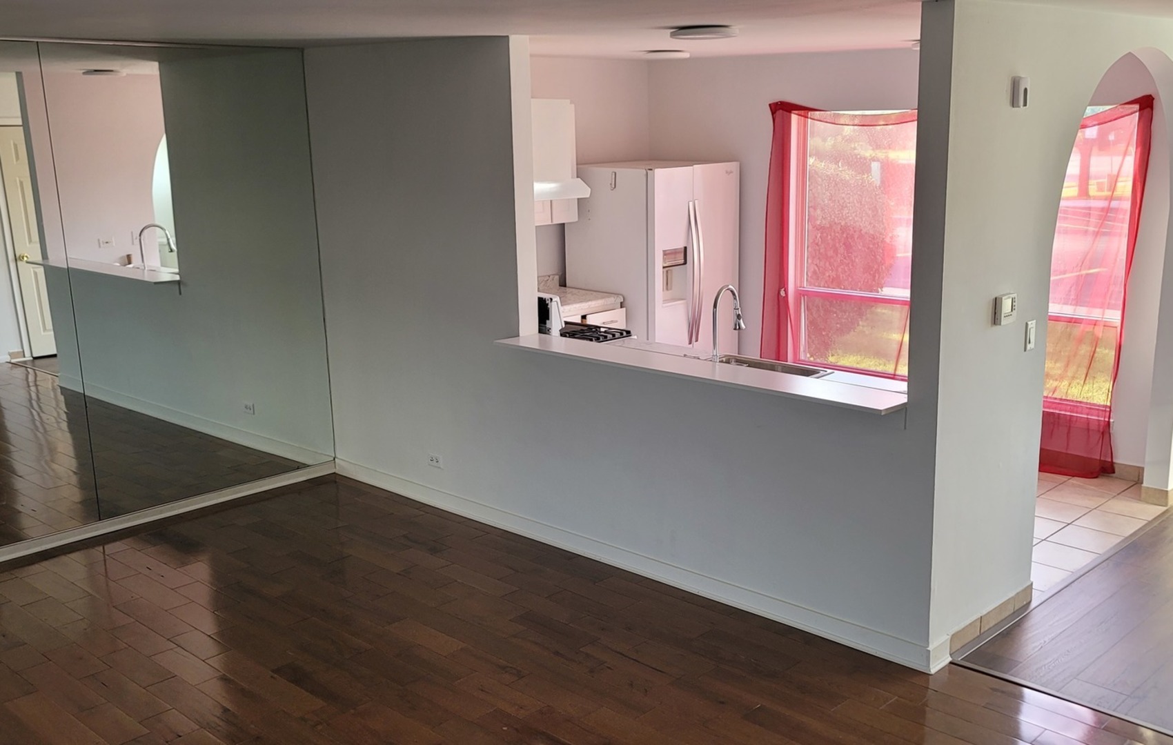 249 Peppertree Lane Aurora, IL 60504 - Photo 5 of 10 an entryway with wooden floor and cabinet