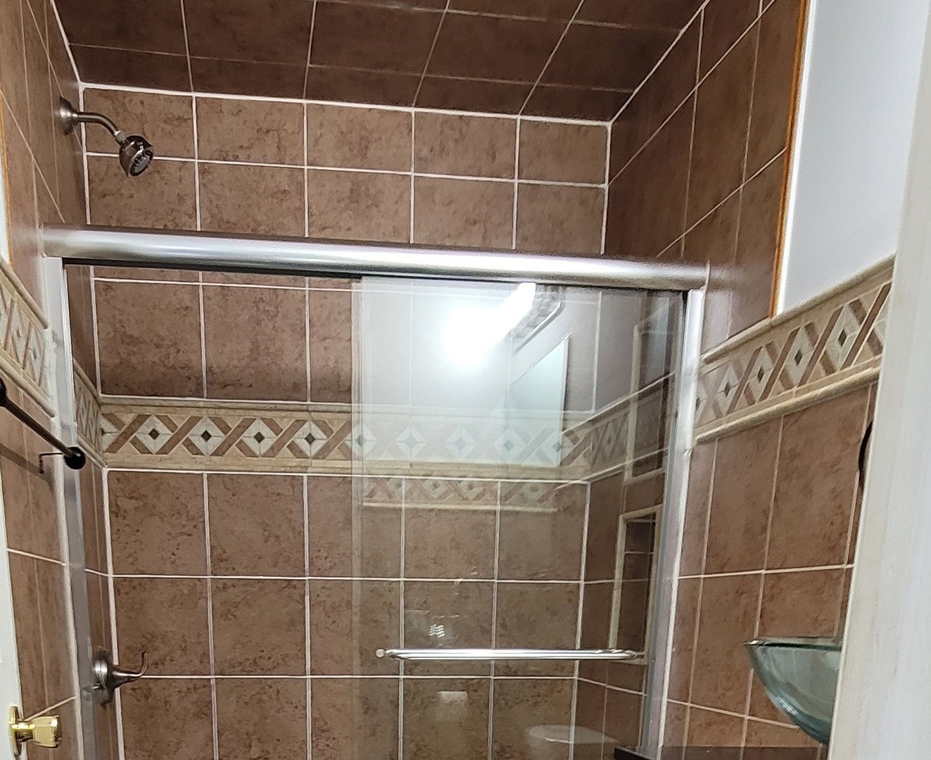 249 Peppertree Lane Aurora, IL 60504 - Photo 8 of 10 a bathroom with a shower and a sink