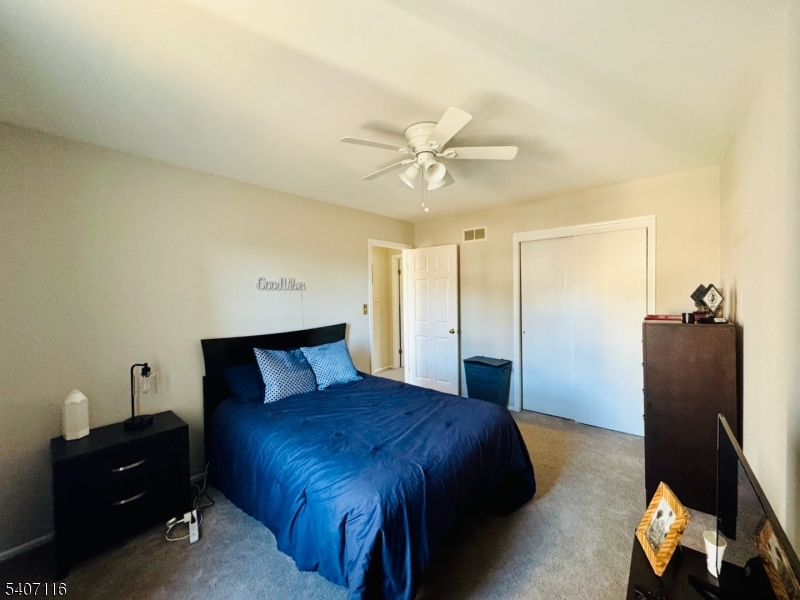 174 Carson Court Somerset, NJ 08873 - Photo 11 of 21 a bedroom with a bed and a dresser
