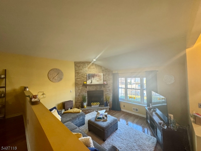 174 Carson Court Somerset, NJ 08873 - Photo 2 of 21 a living room with fireplace furniture and a flat screen tv
