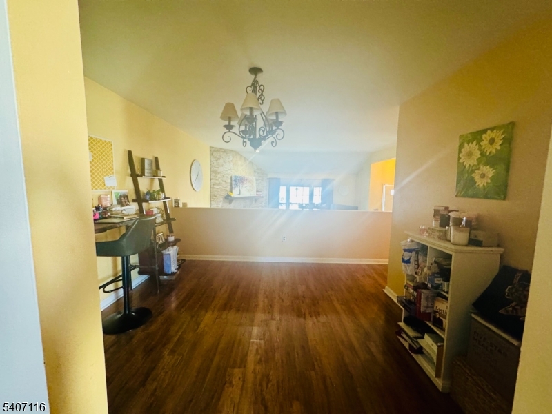174 Carson Court Somerset, NJ 08873 - Photo 4 of 21 a view of a room with wooden floor and furniture