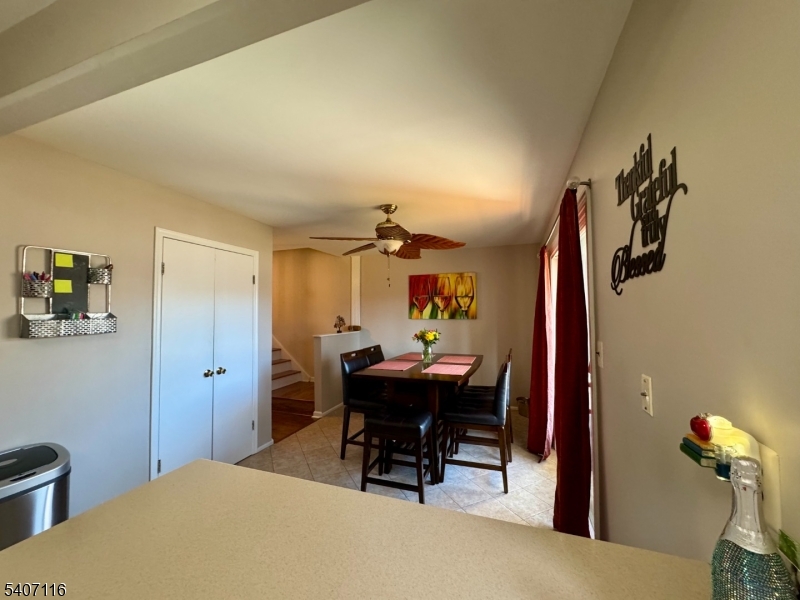 174 Carson Court Somerset, NJ 08873 - Photo 7 of 21 a dining room with a table and chairs