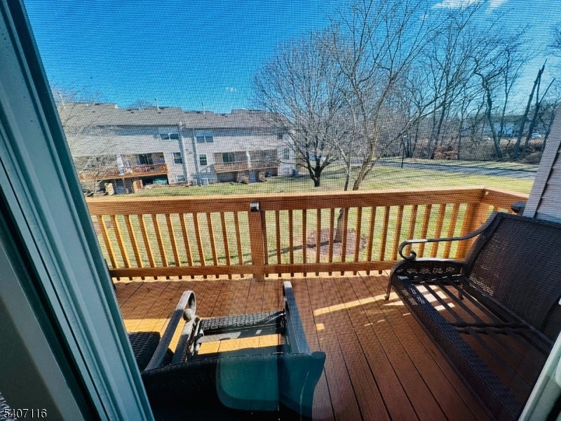 174 Carson Court Somerset, NJ 08873 - Photo 9 of 21 a view of a balcony with wooden floor