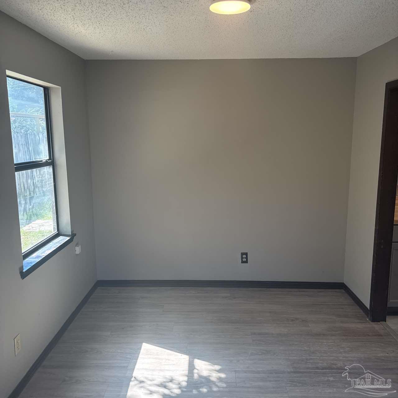 455 Stara Circle, Unit C Pensacola, FL 32505 - Photo 5 of 23 a view of room and window