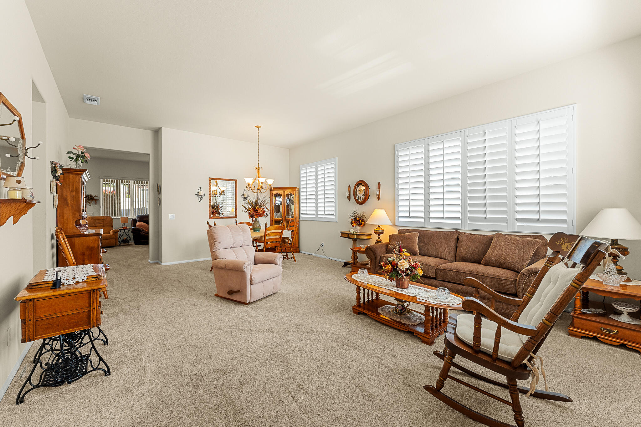 744 Copper Circle Beaumont, CA 92223 - Photo 12 of 44 a living room with furniture and a window