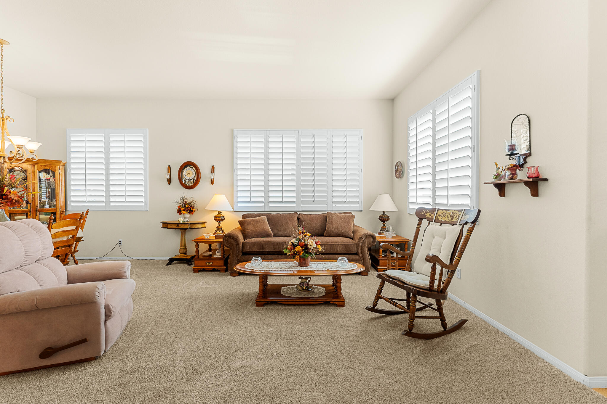 744 Copper Circle Beaumont, CA 92223 - Photo 14 of 44 a living room with furniture and a window