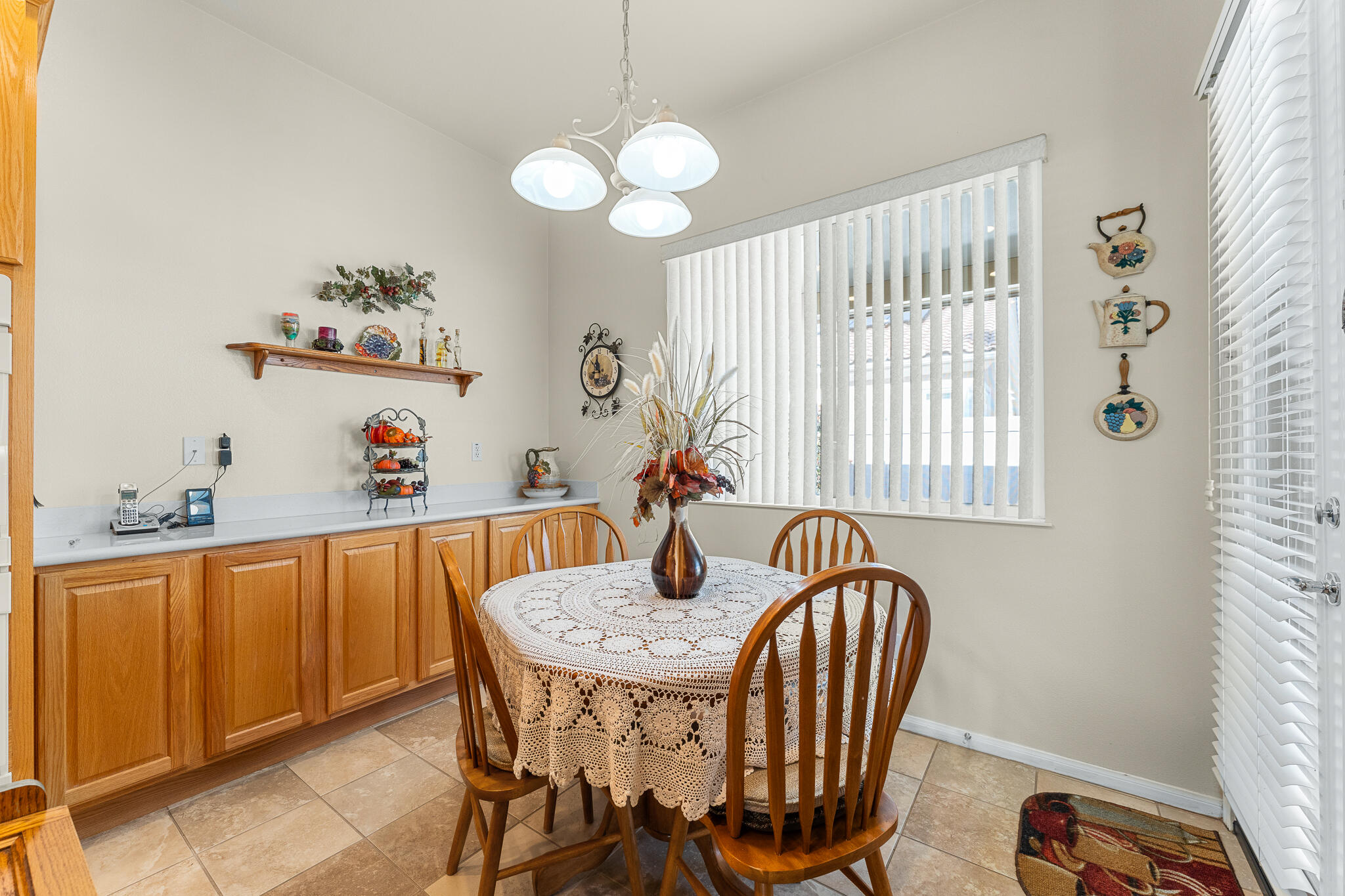 744 Copper Circle Beaumont, CA 92223 - Photo 21 of 44 a dining room with furniture and window