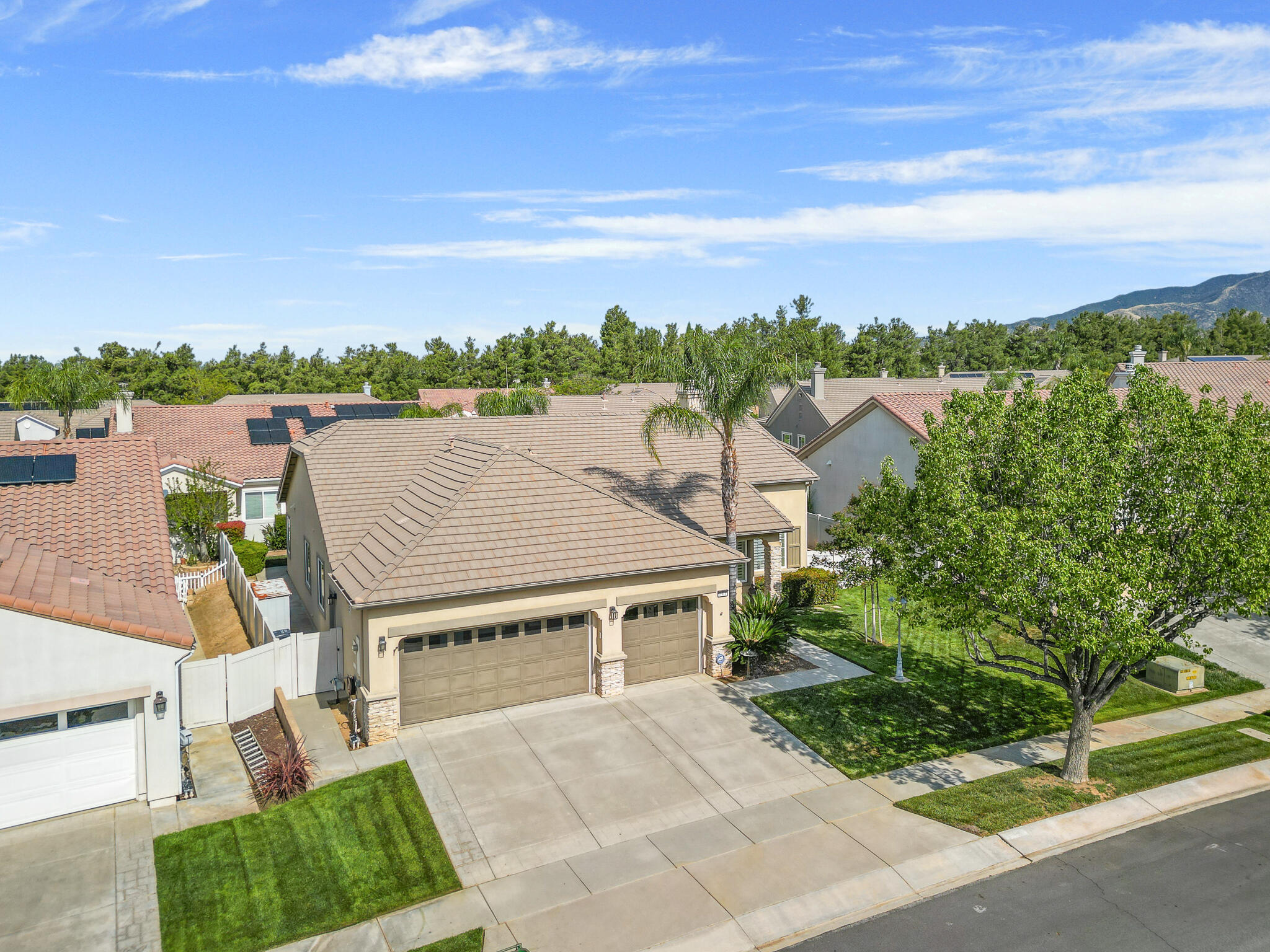 744 Copper Circle Beaumont, CA 92223 - Photo 4 of 44 an aerial view of a house with a garden view