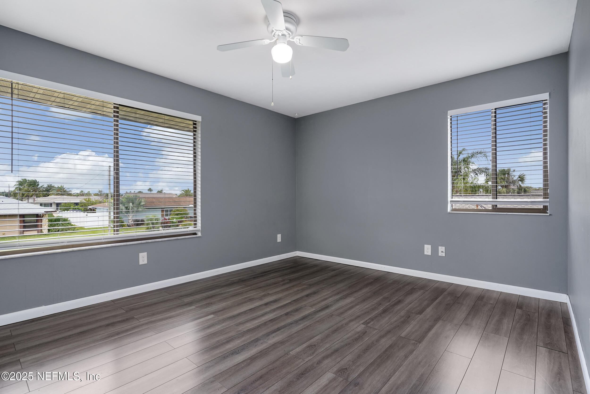 17 Clinton Court South Palm Coast, FL 32137 - Photo 18 of 44 a view of an empty room with wooden floor and a window