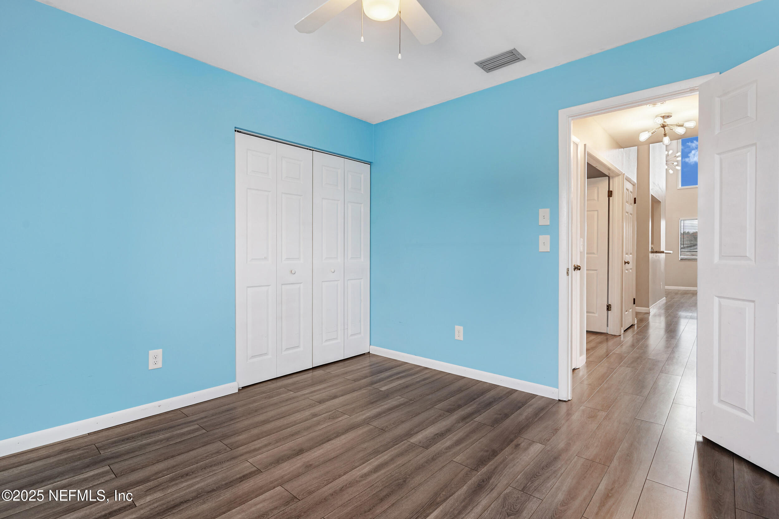 17 Clinton Court South Palm Coast, FL 32137 - Photo 21 of 44 wooden floor in an empty room