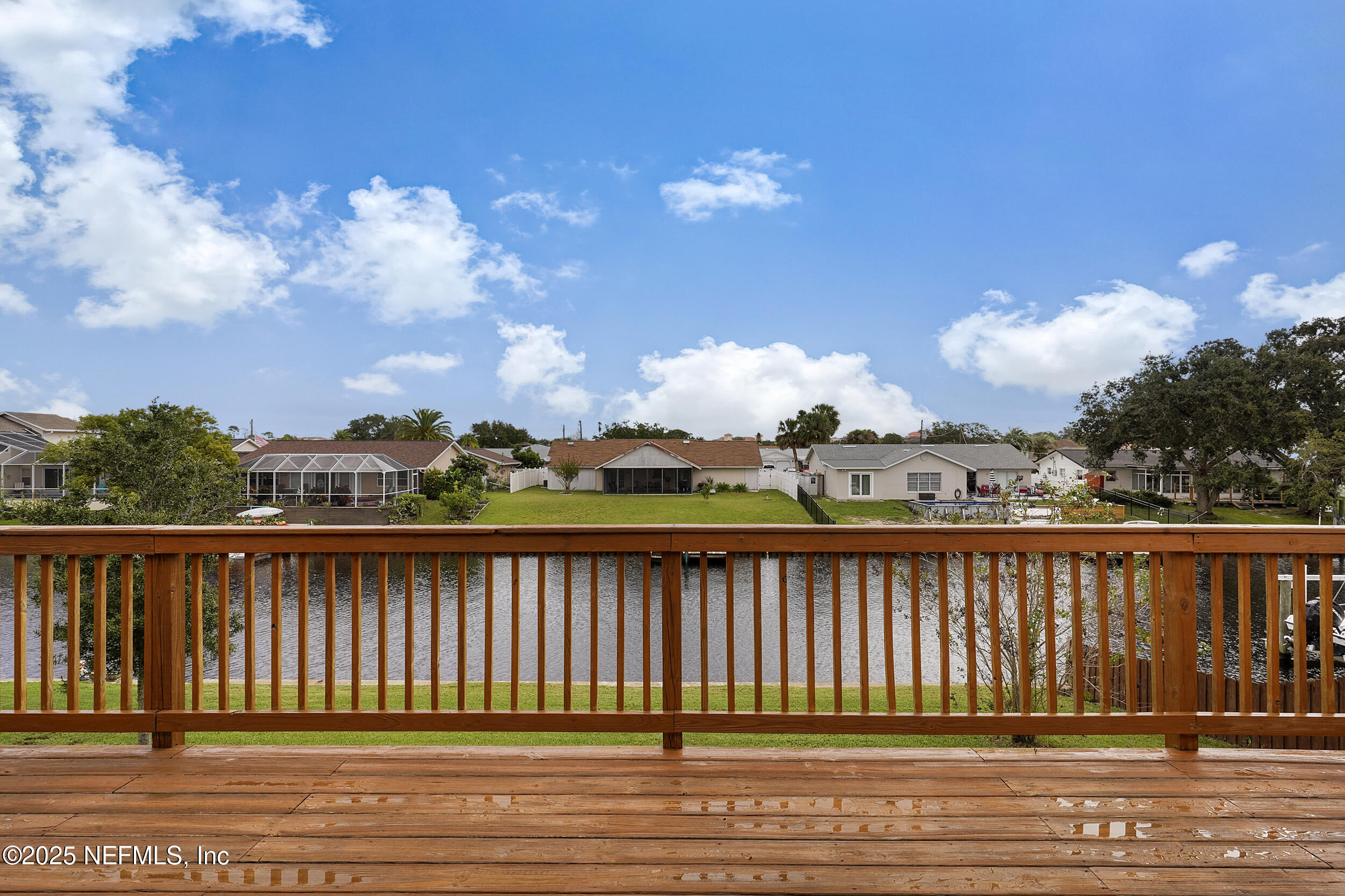 17 Clinton Court South Palm Coast, FL 32137 - Photo 27 of 44 a balcony with wooden floor