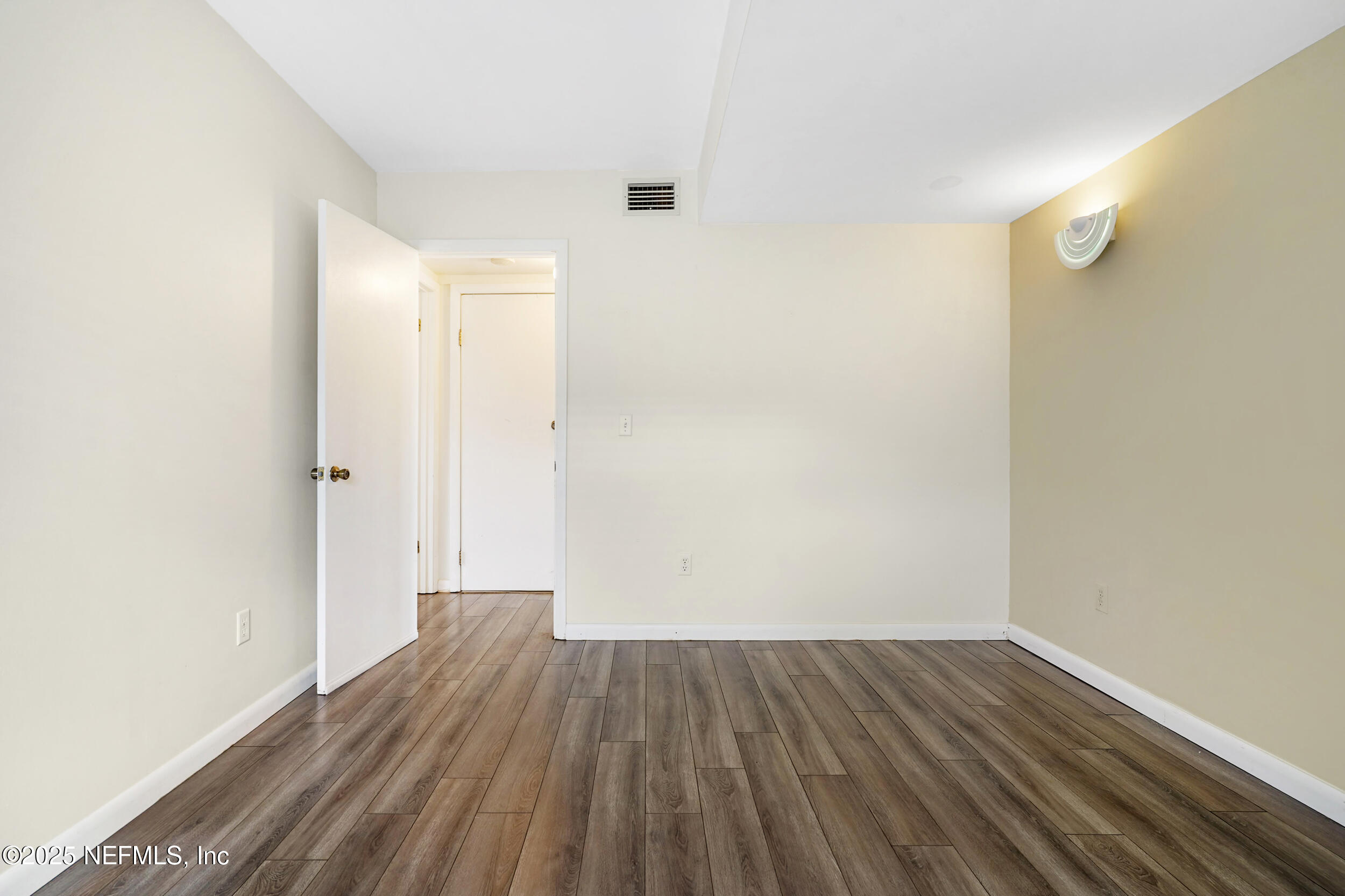 17 Clinton Court South Palm Coast, FL 32137 - Photo 32 of 44 a view of a room with wooden floor