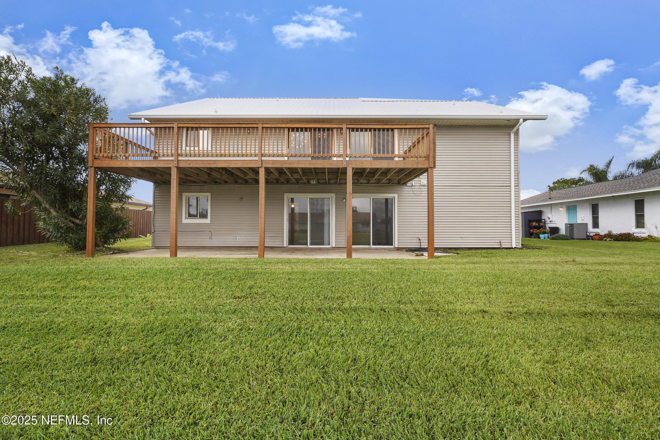17 Clinton Court South Palm Coast, FL 32137 - Photo 41 of 44 a view of a house with a backyard