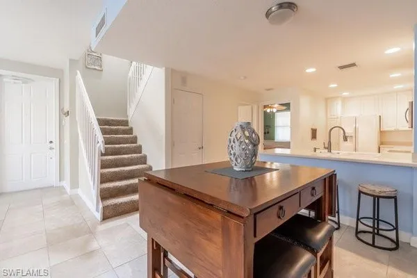 a view of kitchen island with cabinets
